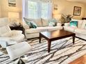 Bright and airy living room with comfortable seating and coffee table at 6501 Stone River Rd # 203, Bradenton, FL 34203