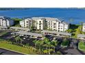 Condo building with covered parking and waterfront views at 1010 Tidewater Shores Loop # 103, Bradenton, FL 34208