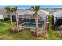 Home with private pool and lush landscaping, in a residential community at 10426 Abaco Falls Dr, Englewood, FL 34223