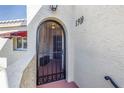 Front door with wrought iron gate at 6101 34Th W St # 19H, Bradenton, FL 34210