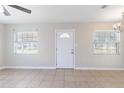 Bright and airy living room featuring tile floors and ample natural light at 2410 13Th W St, Palmetto, FL 34221