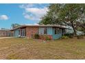 Ranch style home with brick facade and carport at 3128 Bay St, Sarasota, FL 34237