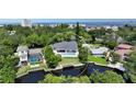 Waterfront home with pool, lawn and private dock at 4815 Featherbed Ln, Siesta Key, FL 34242