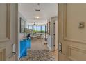 Open and spacious entryway leading into living room at 575 Sanctuary Dr # A303, Longboat Key, FL 34228