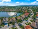 Aerial view showcases this property's premier lakefront location with neighborhood views at 518 Luminary Blvd, Osprey, FL 34229