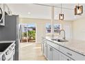 Modern kitchen featuring granite countertops and stainless steel appliances at 2108 30Th W Ave, Bradenton, FL 34205