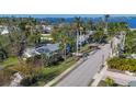 An aerial view showcasing a beautiful neighborhood near the water at 118 24Th W St, Bradenton, FL 34205