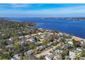 Wide shot of waterfront homes and lush tropical landscape at 118 24Th W St, Bradenton, FL 34205