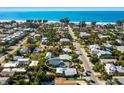 Aerial view showcasing the home's location near the beach at 307 Spring Ave, Anna Maria, FL 34216