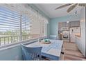 Eat-in kitchen with white appliances and light wood countertops at 4460 Ironwood Cir # 403A, Bradenton, FL 34209