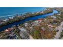 Property has waterfront access and is near the ocean at 8440 Midnight Pass Rd, Sarasota, FL 34242