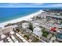 Aerial view showing condo location near beach and other amenities at 1130 W Peppertree Ln # 118, Sarasota, FL 34242