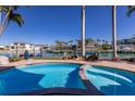 A luxurious swimming pool and spa next to waterfront canal views at 367 W Royal Flamingo Dr, Sarasota, FL 34236