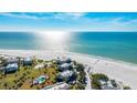 Beautiful beachfront condos with pool, surrounded by palm trees and stunning ocean views at 7155 Gulf Of Mexico Dr # 22, Longboat Key, FL 34228