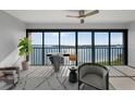 Bright and airy balcony with water views, perfect for relaxing or working with a view at 1751 Beach Rd # 404, Englewood, FL 34223