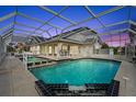 Gorgeous screened in pool with spa at 6170 Misty Oaks Dr, Sarasota, FL 34243
