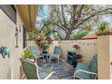 Relaxing outdoor patio with comfortable seating and plants, creating a cozy spot for entertaining and relaxation at 5343 Huntingwood Ct # 33, Sarasota, FL 34235