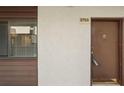 Front door of unit 2753 showing exterior details and access to the home at 2753 Orchid Oaks Dr # 104, Sarasota, FL 34239