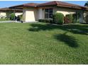 Manicured front yard and covered parking enhance this single-story home at 3314 Mcdill Rd # 3314, Bradenton, FL 34207