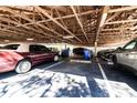 Covered parking area with assigned spaces offering protection from the elements at 4570 Pinebrook Cir # 303, Bradenton, FL 34209