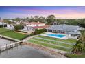 Waterfront homes each featuring private pools, docks, and impeccably landscaped yards at 7416 Riverview Dr, Bradenton, FL 34209