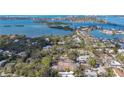 Aerial view of a building site surrounded by established homes near the water at 1401 Crocker St, Sarasota, FL 34231