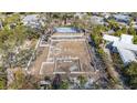 New home foundation surrounded by mature trees ready for building in a quiet neighborhood at 1401 Crocker St, Sarasota, FL 34231