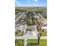 Birds-eye view of home showcasing mature trees and neighborhood at 2721 12Th St, Englewood, FL 34224