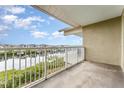 Balcony view of a bay with greenery, homes, and boats at 559 Bahia Beach Blvd, Ruskin, FL 33570