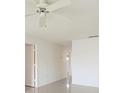 Hallway with white walls and tiled flooring at 2782 Woodgate Ln # 18, Sarasota, FL 34231