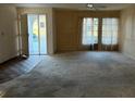 Bright living room featuring an exterior view and lots of natural light at 1546 Grand Blvd # 108, Sarasota, FL 34232