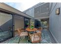 Charming courtyard features a bistro set and view to interior at 362 Pine Run Dr, Osprey, FL 34229