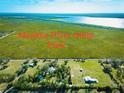 Aerial view of property near Myakka River State Park, showcasing the beautiful landscape and surrounding area at 4939 Myakka Valley Trl, Sarasota, FL 34241