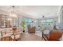 Inviting living room with natural light, modern decor, and views of the community at 4320 Falmouth Dr # 301, Longboat Key, FL 34228
