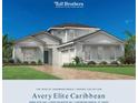 Avery Elite Caribbean home featuring a two-car garage, blue door, manicured landscaping and a beautiful paved driveway at 17903 Palmiste Dr, Bradenton, FL 34202