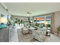 Spacious living room with water views, stylish furniture, and plenty of natural light at 4722 Independence Dr, Bradenton, FL 34210