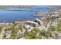 Stunning aerial view of waterfront property with marina and bay in the background at 210 N 17Th W St # 12, Bradenton, FL 34205
