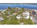 Picturesque aerial view of a waterfront community with lush greenery and serene water views at 210 N 17Th W St # 12, Bradenton, FL 34205