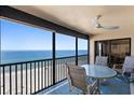 This tiled balcony has a seating arrangement and boasts stunning views of the ocean at 900 Gulf Blvd # 805, Indian Rocks Beach, FL 33785
