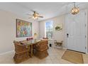 Cozy dining area featuring a unique table with wicker chairs, suitable for intimate gatherings at 5684 Duval St, Bradenton, FL 34203
