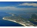 Aerial view of the beach front community with inter coastal waterway views at 5780 Midnight Pass Rd # 303B, Sarasota, FL 34242