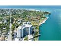 Aerial view of waterfront condo showcasing its prime location and serene surroundings at 4822 Ocean Blvd # 2D, Sarasota, FL 34242