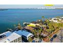 An aerial view of the property shows its waterfront location and proximity to the John Ringling Bridge at 244 N Washington Dr, Sarasota, FL 34236
