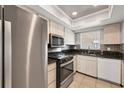Updated kitchen featuring stainless steel appliances and granite countertops at 4608 Park Acres Dr, Bradenton, FL 34207