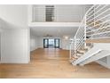 Bright living room with wood floors and waterfront views at 4620 Riverview Blvd, Bradenton, FL 34209