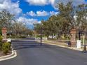 Gated entrance to the Creekside Preserve community, offering security at 9043 39Th Street E Cir, Parrish, FL 34219