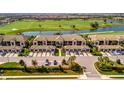 A row of residential houses featuring garages provides modern comforts and neighborhood living at 5710 Palmer Cir # 105, Bradenton, FL 34211