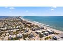 Extensive aerial view of beachfront community displaying beautiful ocean views and neighborhood layout at 204 66Th Street, Holmes Beach, FL 34217