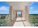 Exterior hallway view with white railing and stunning views at 2625 Terra Ceia Bay Blvd # 504, Palmetto, FL 34221
