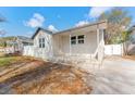 Charming single-story home with a covered front porch and freshly painted exterior at 3457 50Th N Ave, St Petersburg, FL 33714